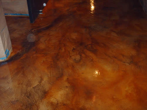 acid stained concrete floor SoCo Lofts Dallas, TX